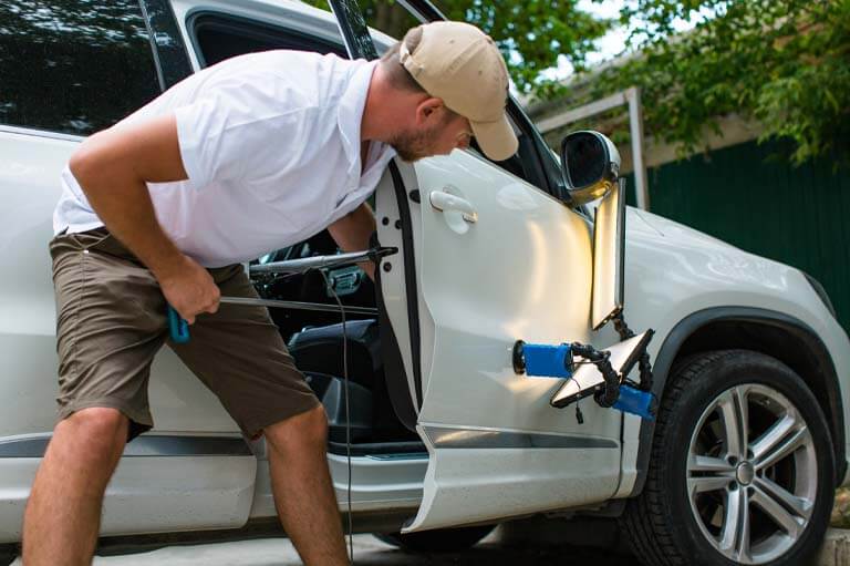 how to do paintless dent repair